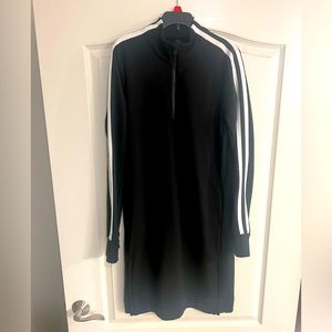 ATHLETA Dress Black w/white stripes on arm sleeves. Excellent condition.